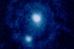 Picture of Pluto and Charon taken by the Hubble Space Telescope